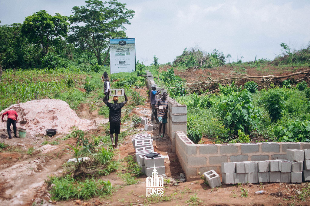 engineers building a fence/building